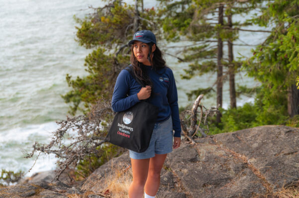 Indigenous women outdoors merch black large zip tote featured x